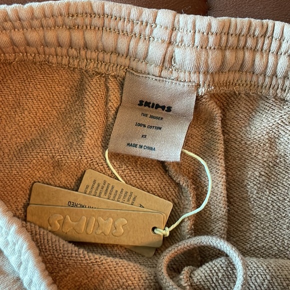 SKIMS Pants - SKIMS Cotton Fleece Jogger (color: Tigers eye)